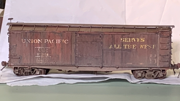 Completed, heavily weathered UP box car in HO scale.