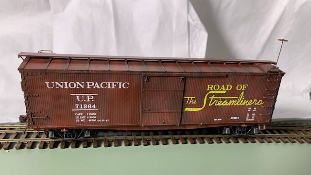 HO scale box car painted and decaled, awaiting weathering.