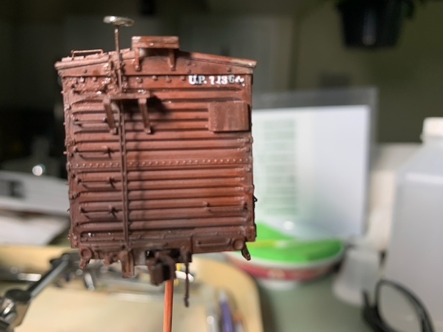 HO scale UP box car being panel lined.