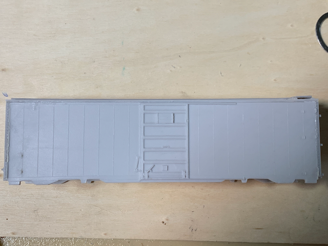 HO scale box car side after gap filling with the mask removed.