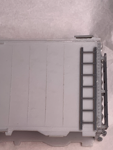HO scale box car corner ladder installation.