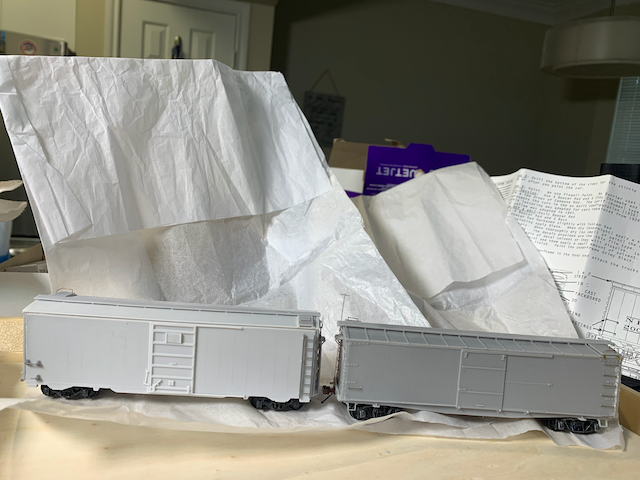 HO scale box car Project Lombard, before painting, with the unpainted companion Project Gable.