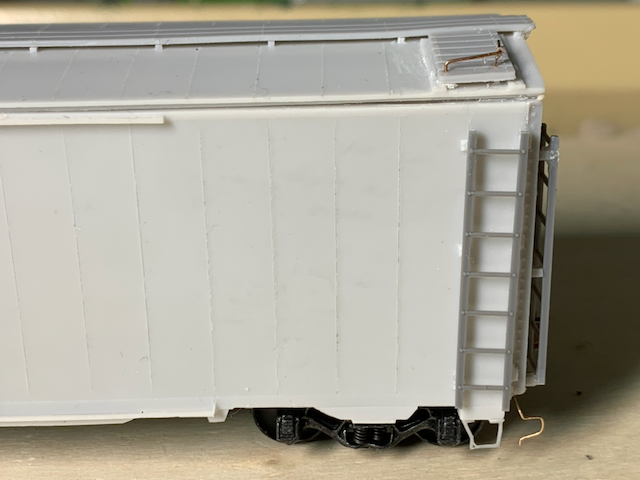 HO scale box car, assembly completed, detail of A end from the side showing details.