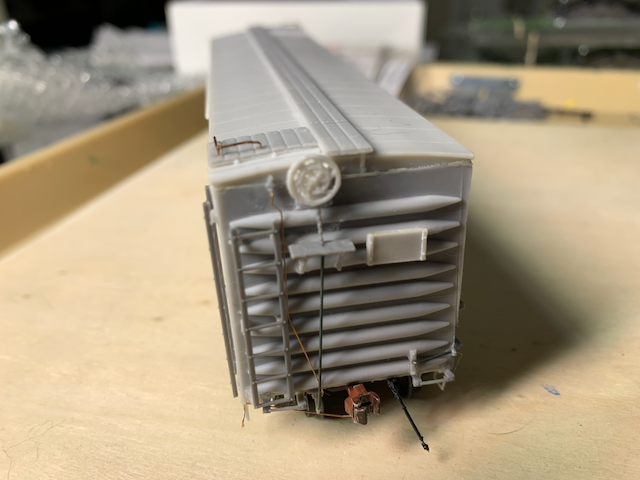 HO scale box car, assembled but unpainted, B end.